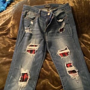 Judy Blue jeans, distressed with buffalo check patches.
